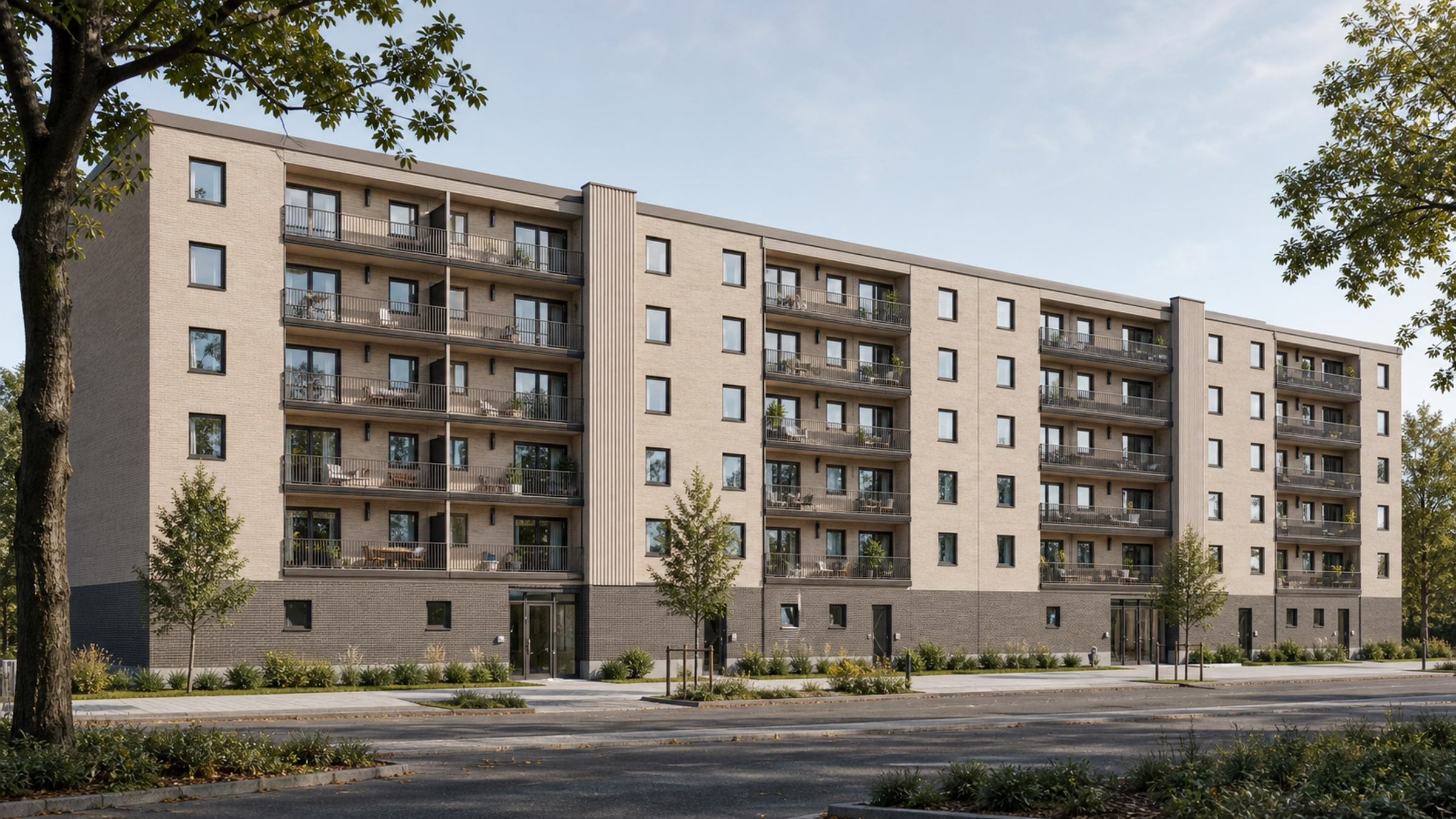 Flerbostadshus i Kv. Vildrosen med sammanhållen tegelgestaltning och balkongrytm