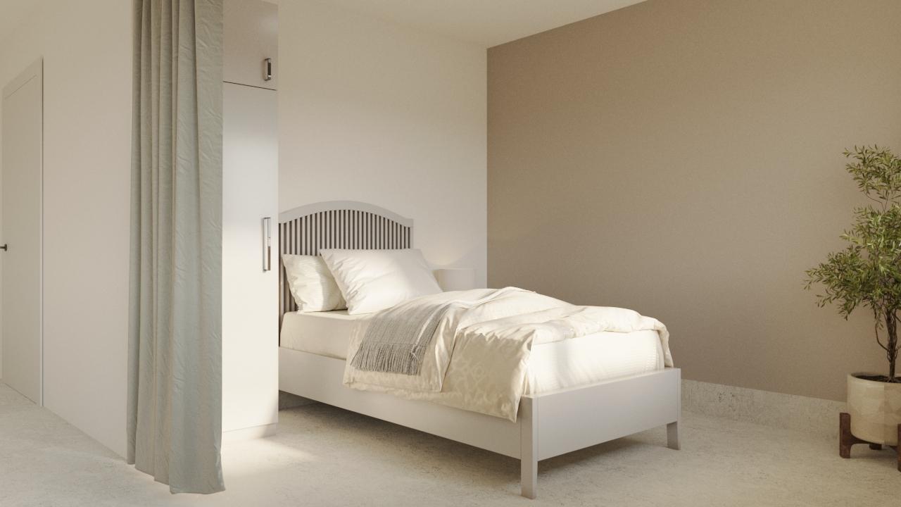 Sovrum i LSS Nocken med säng och ljus inredning anpassad för boende.