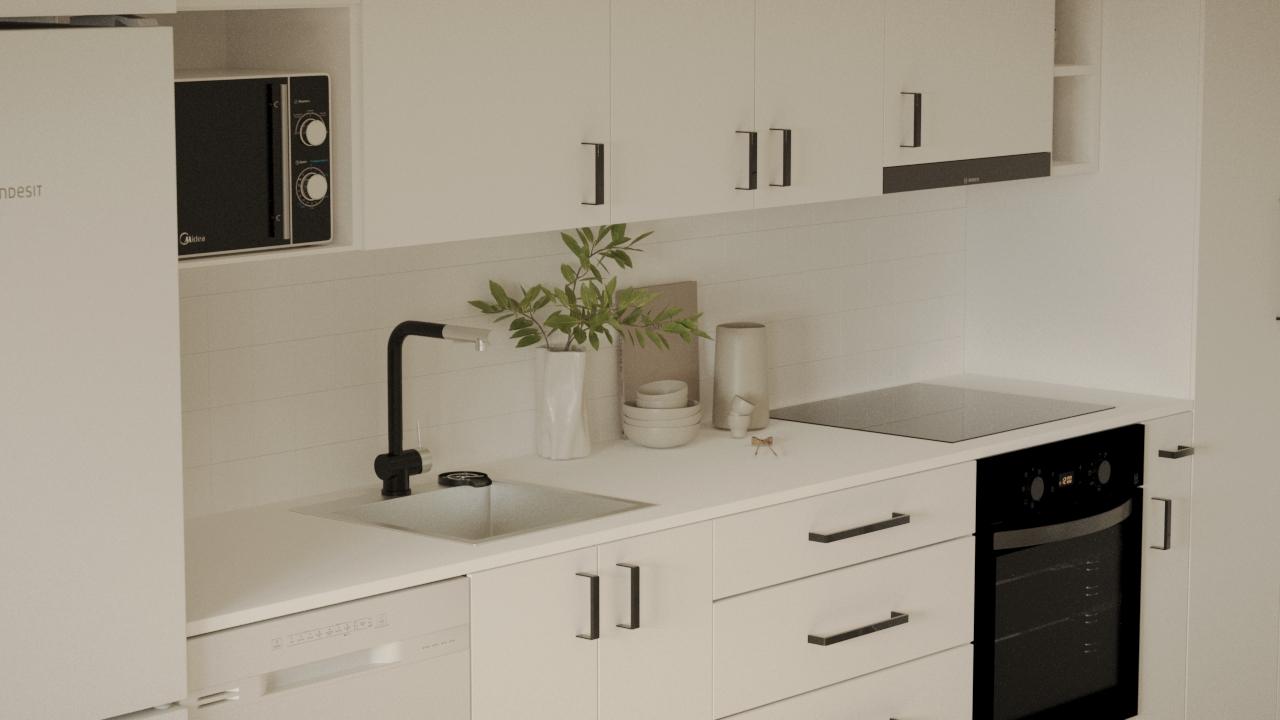 Detaljvy av köksbänk i LSS Nocken med diskho, induktionshäll och ljusa ytskikt.