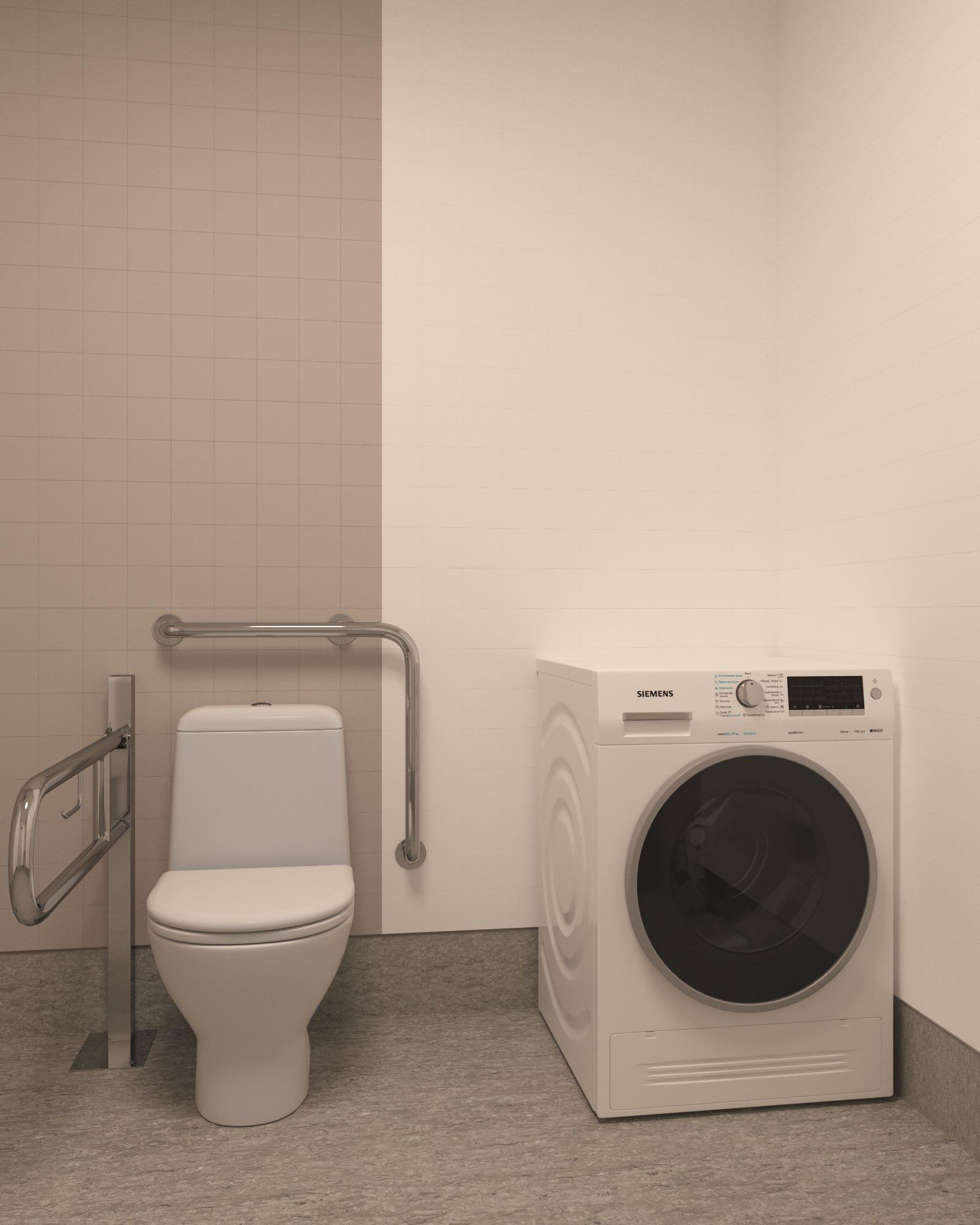 Handikappanpassad toalett och tvättdel i LSS Nocken med stödhandtag och tvättmaskin.