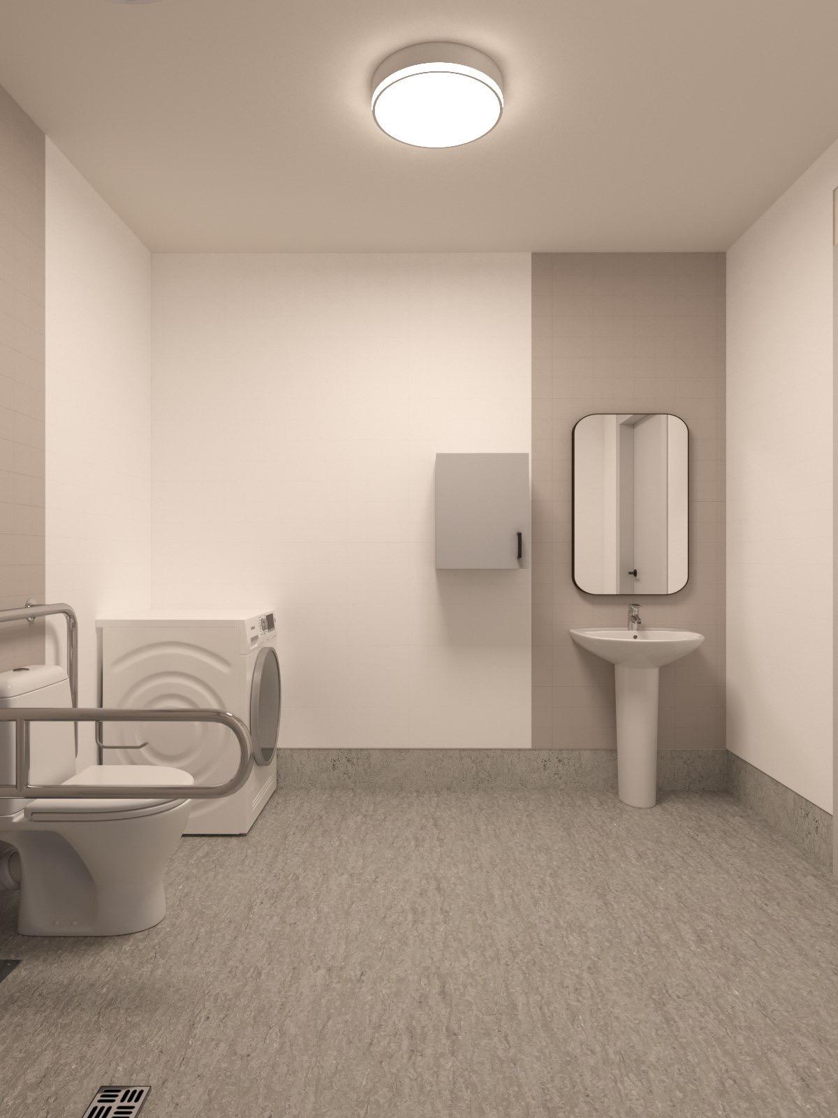 Handikappanpassad toalett i LSS Nocken med stödhandtag och spegel.