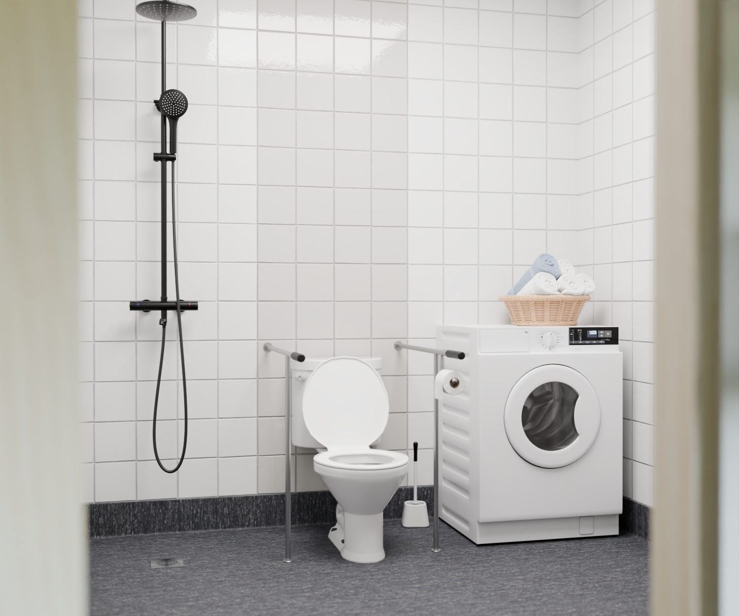 Tillgänglighetsanpassat badrum i LSS Tureberg med dusch, toalett med stödhandtag och tvättmaskin.